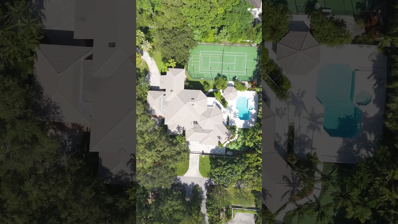 A tennis lover's dream! Resort style living in this magnificent 2 story Pinecrest Estate!
