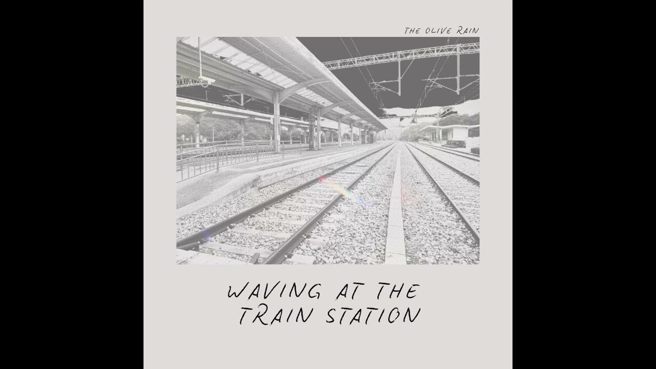 Waving at the Train Station