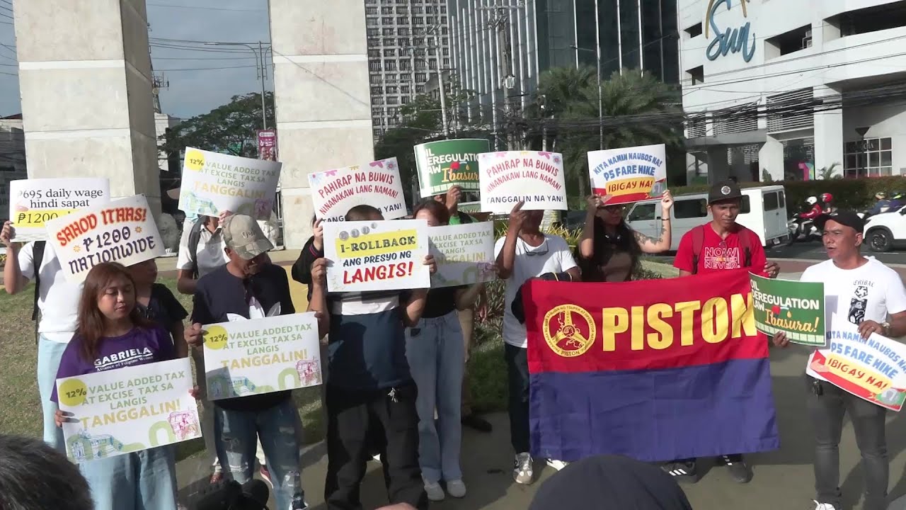 Filipino jeepney drivers protest against high fuel prices government fare hike U-turn | AFP