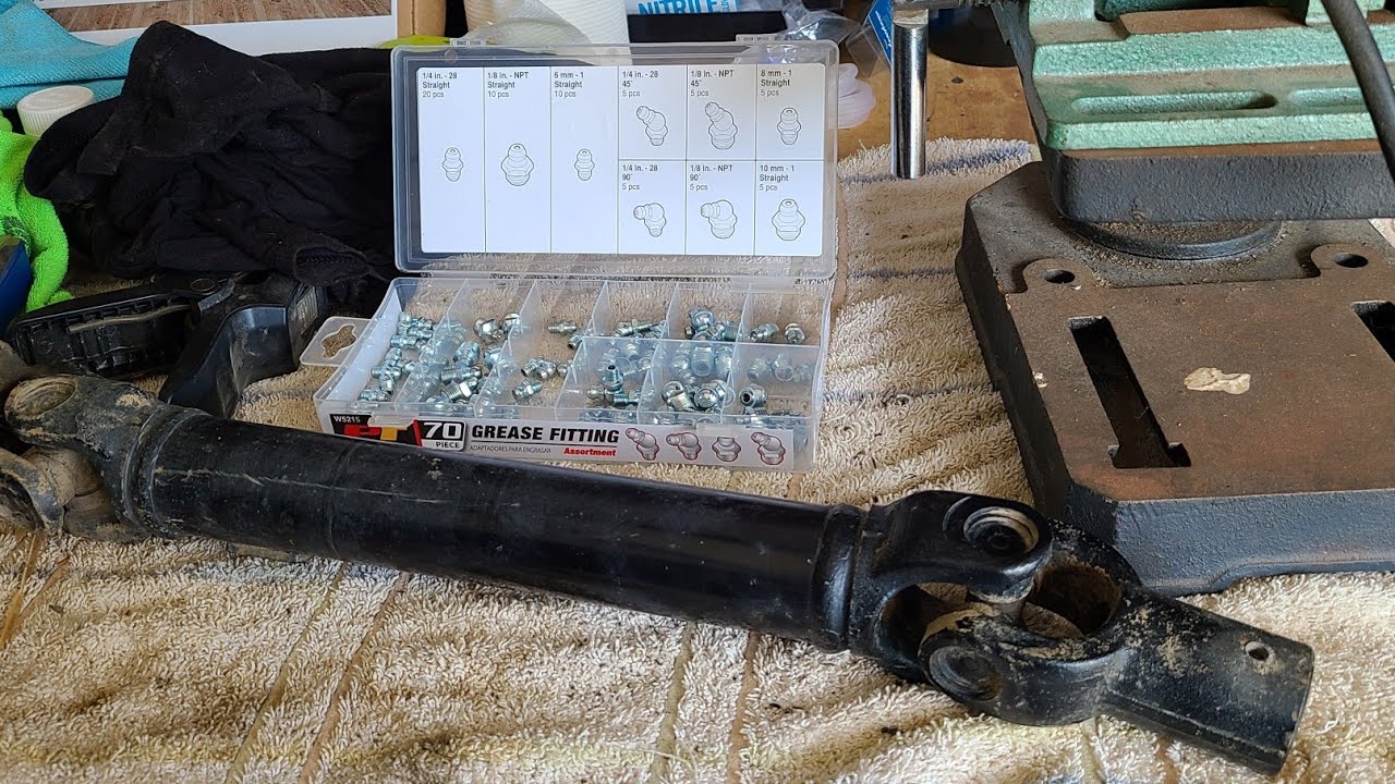 Can Am X3 drive line rattle fix!! EASY! Grease fitting install!!!!