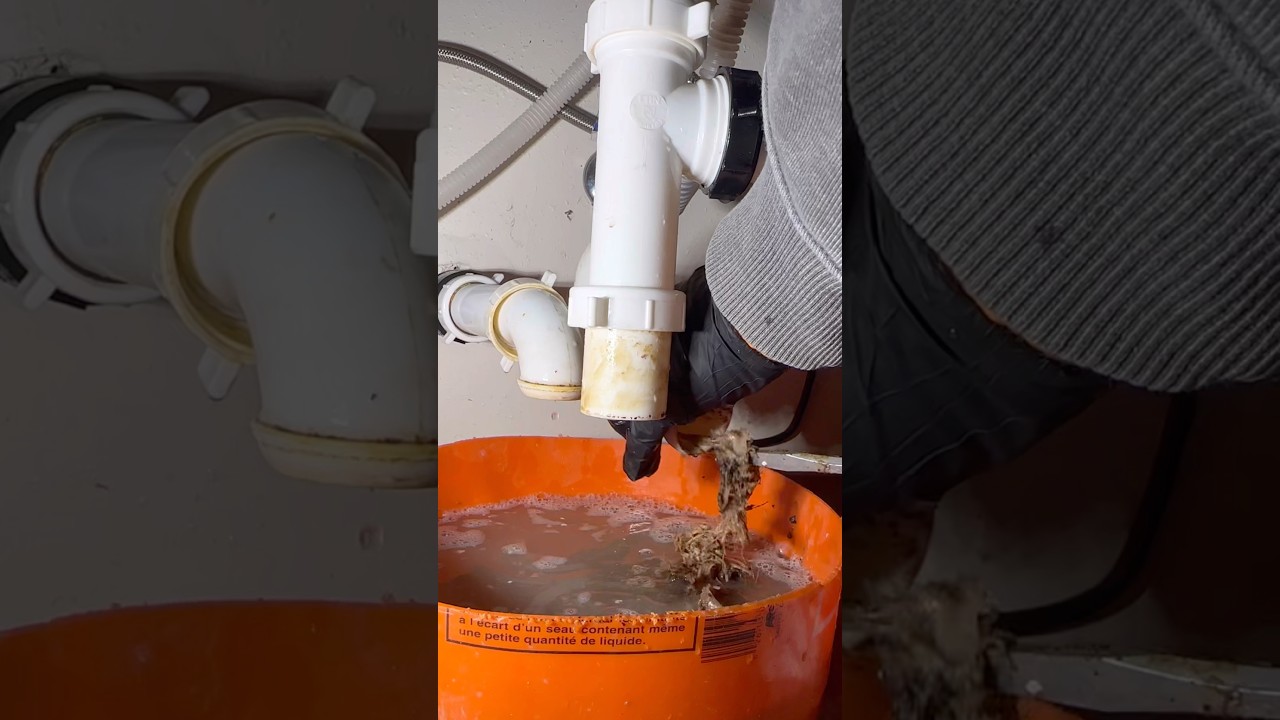 fixing a clogged kitchen sink drain