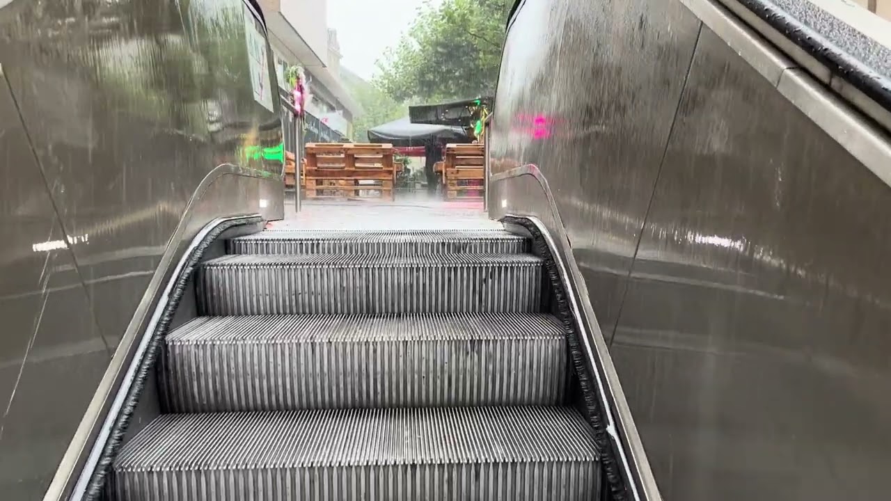 Frankfurt, Germany. 2x Escalator ride RAINING HEAVILY! At an outdoor exit for Hauptwache Station.
