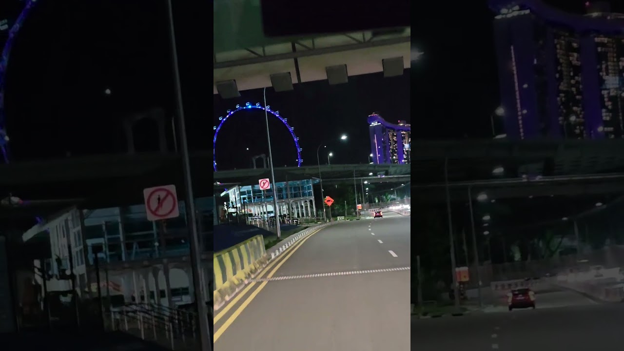 Singapore night drive 🚗🌃 &mdash; glowing roads, tall towers, and a city alive with magic.#SingaporeNights