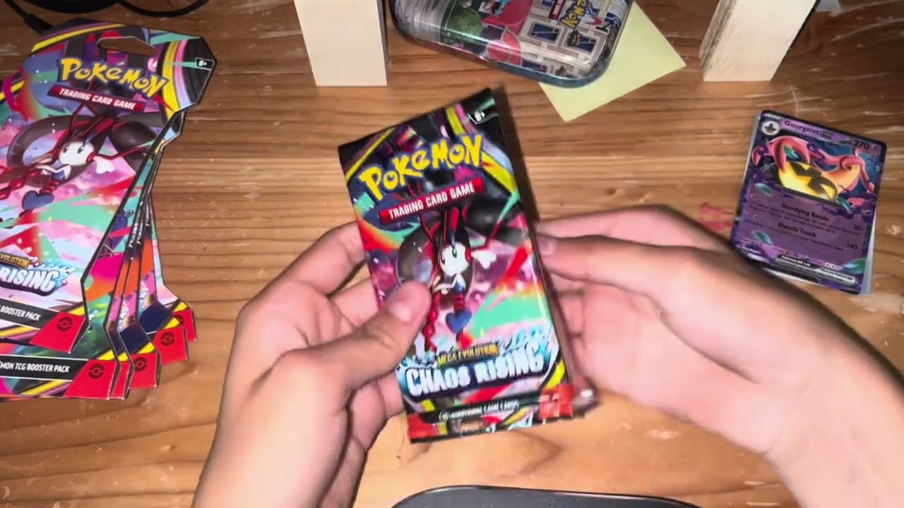 Opening Pokemon cards mega evolution chaos rising part 1 of 3