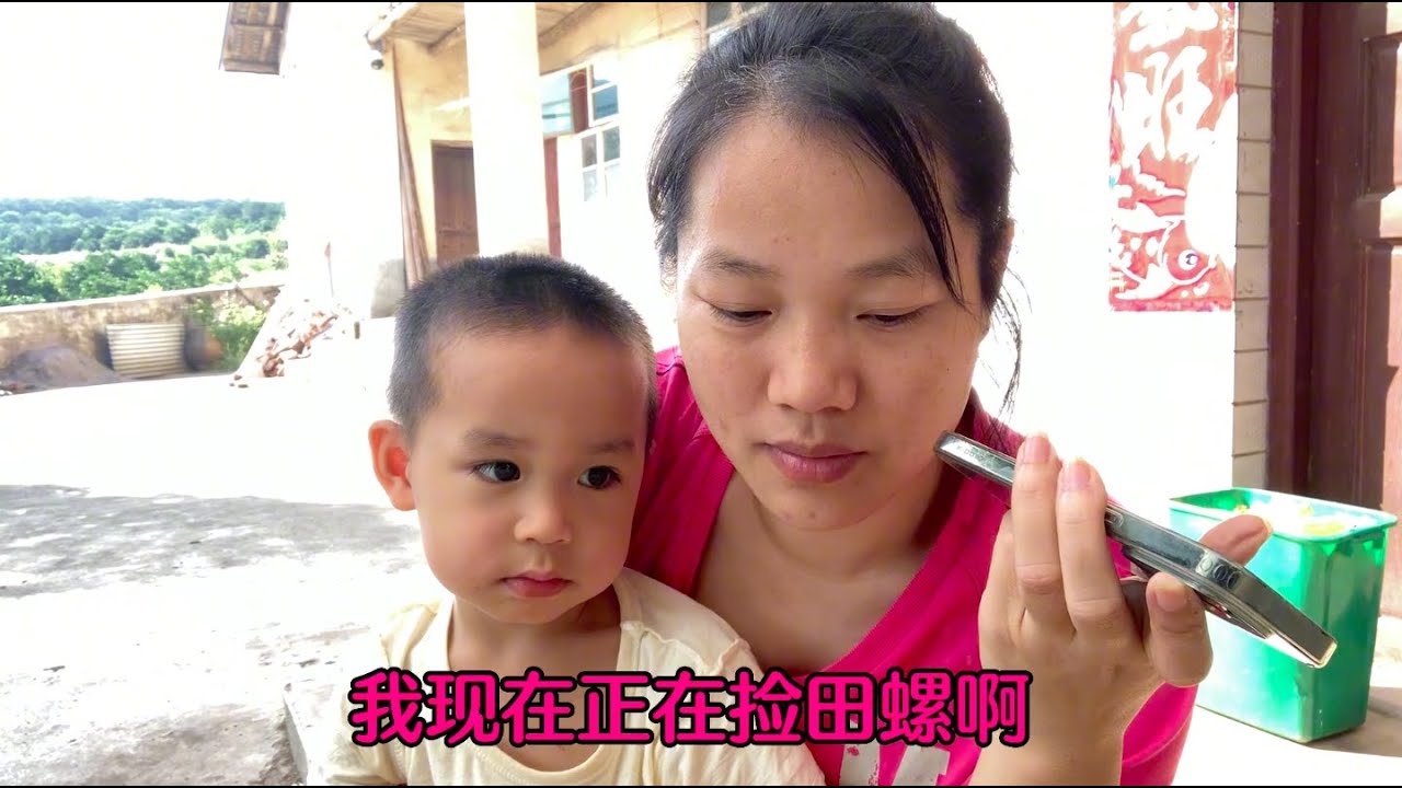 湖南搞农业小伙坚持生态种养稻田里好多田螺，小伙对前景充满希望