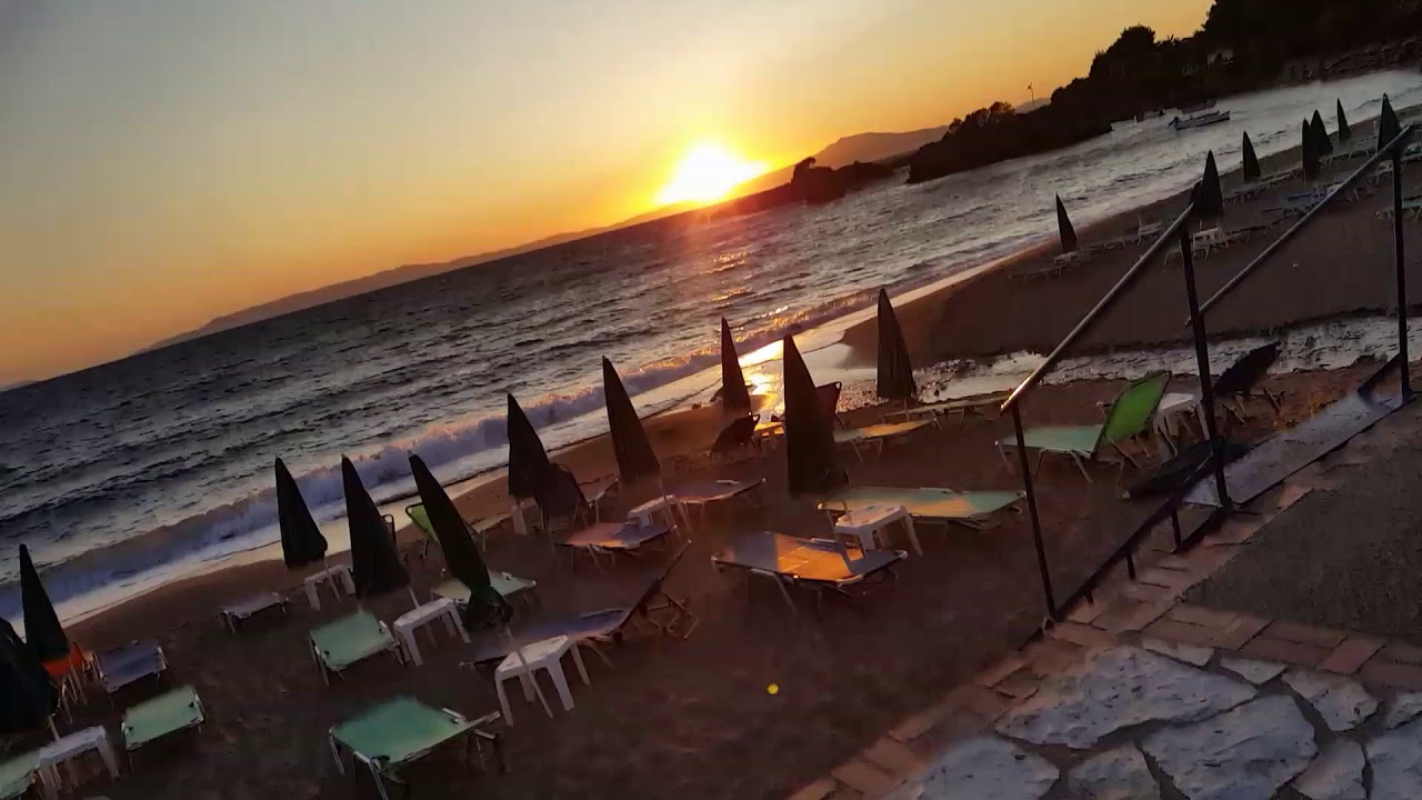 Stoupa beach, Greece, at sunset.