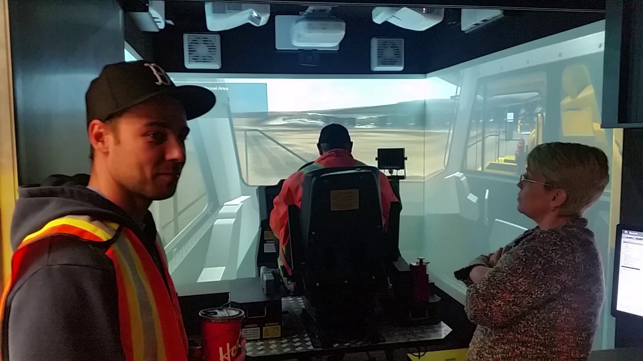 Student driving the rock truck Simulator