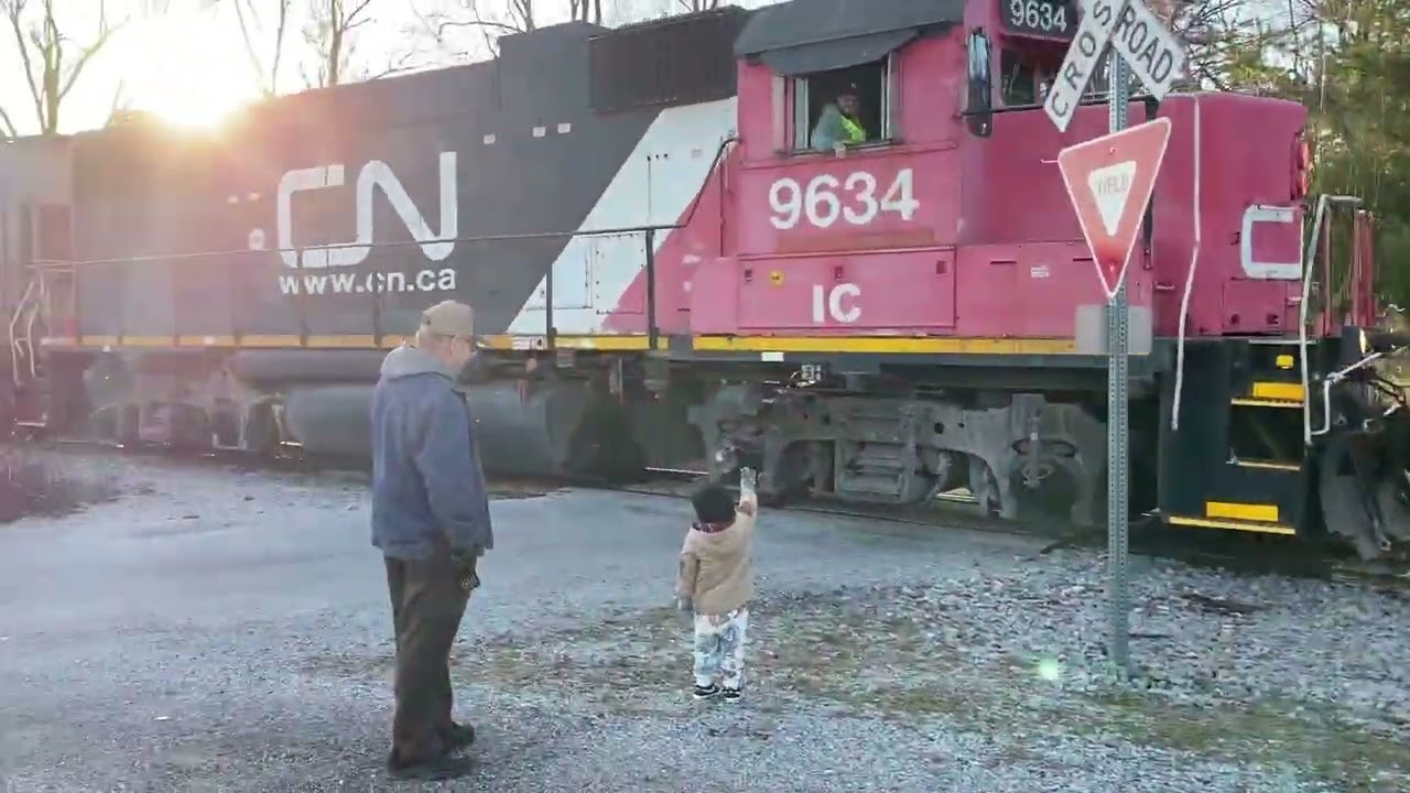train honking and waving to Easton
