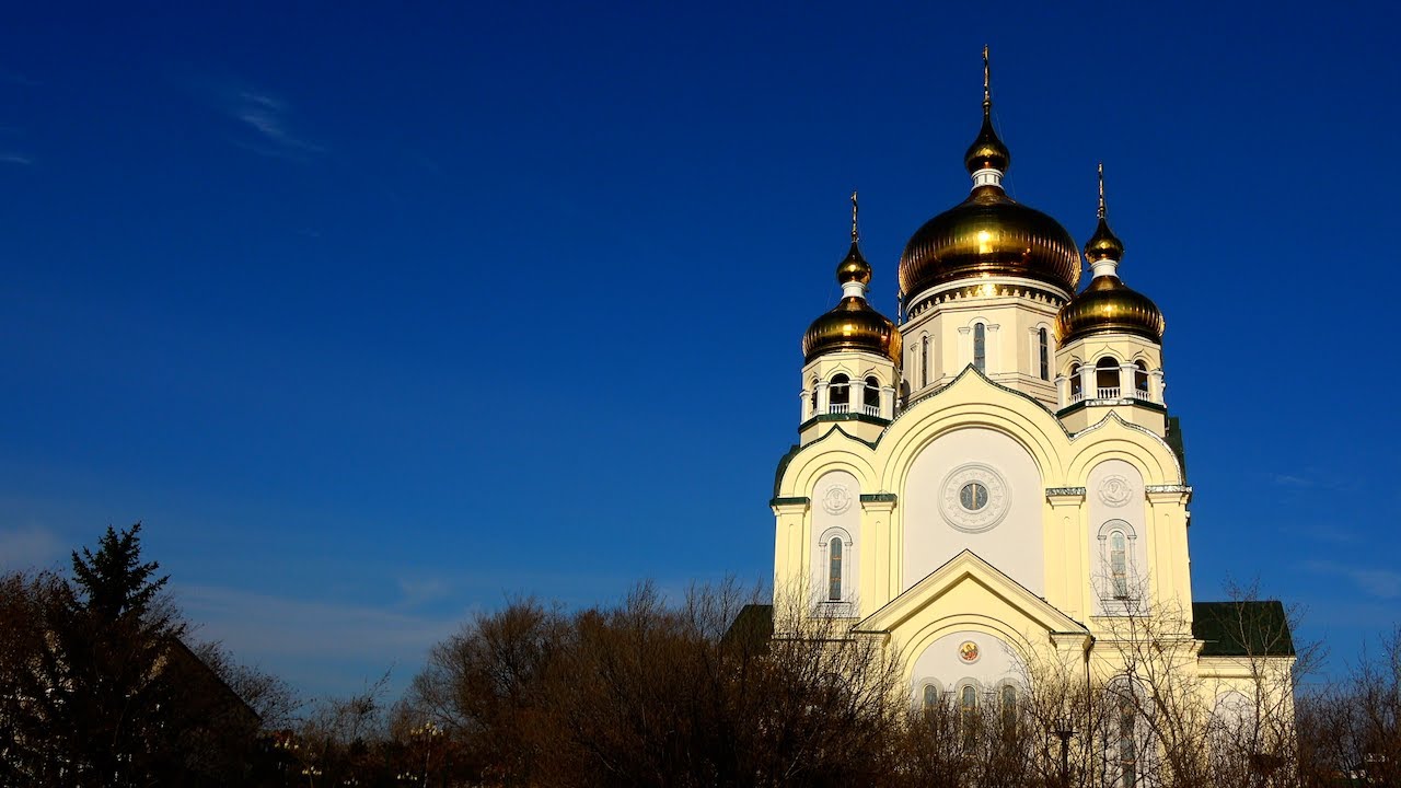 View of the Orthodox Cathedral. Long 4K video. Sounds of birds, cars and airplanes.