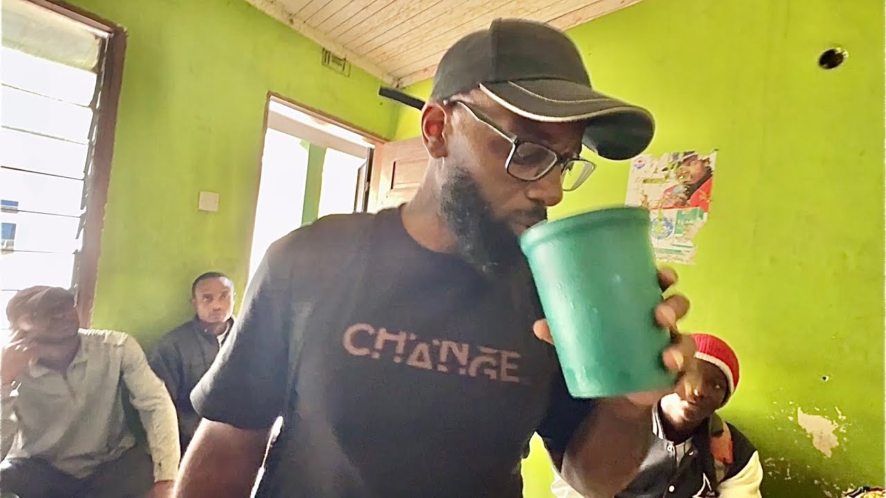 Tasting local banana wine in Arusha Tanzania and Tour of market