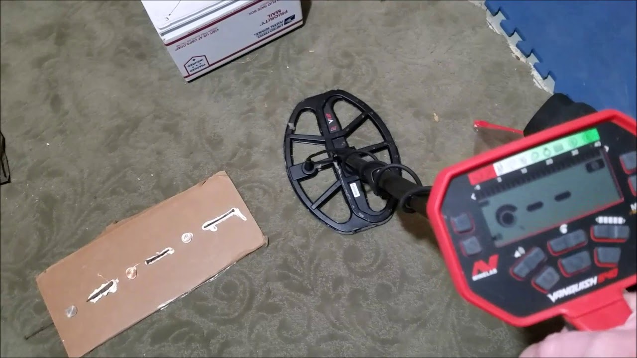 Minelab Vanquish 540 initial tests beach, mineralized soil and iron masking