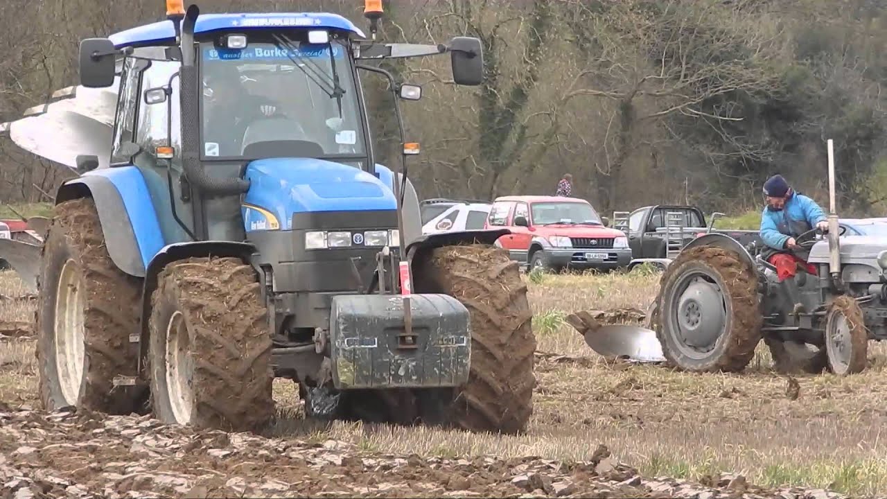 New Holland  TM 140  ploughing