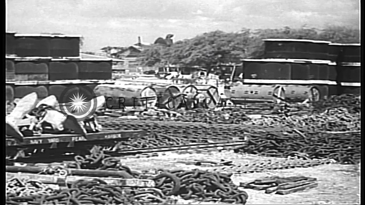 Barrels and wooden logs are stacked on the ground at Pearl Harbor, Hawaii, United...HD Stock Footage