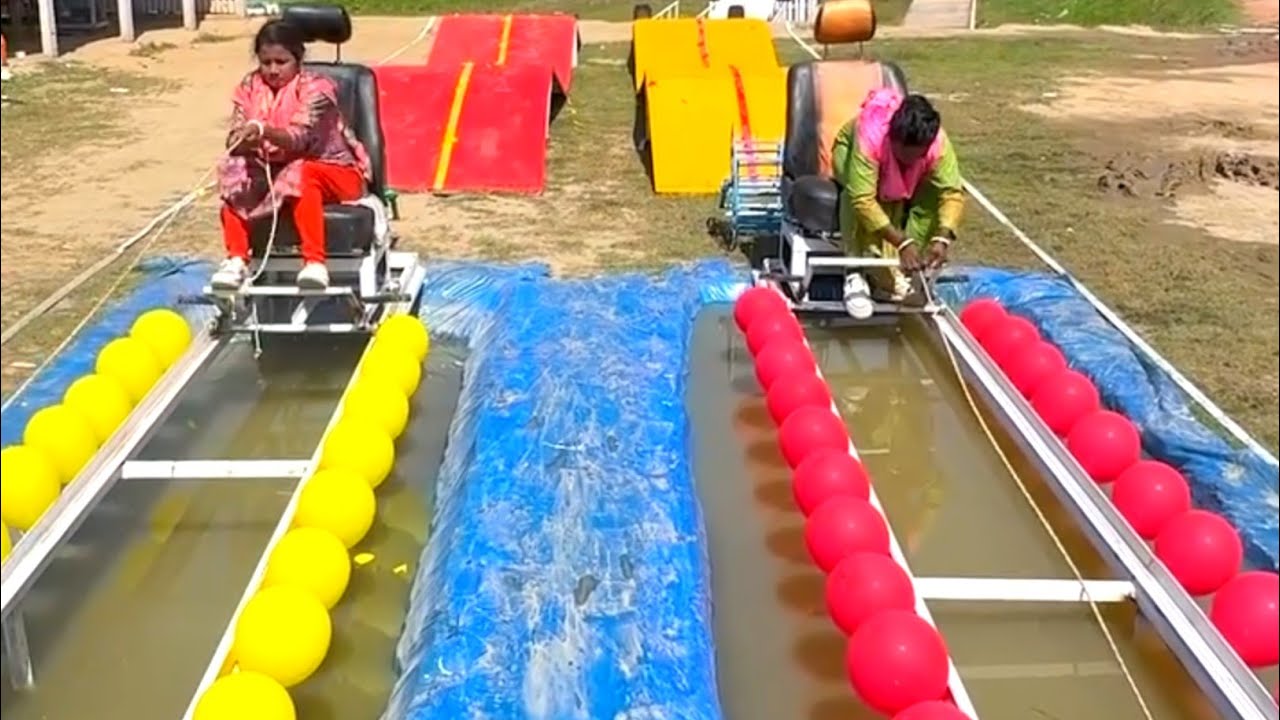 Two people are awesome in this funny balloon bursting game by driving the chair car