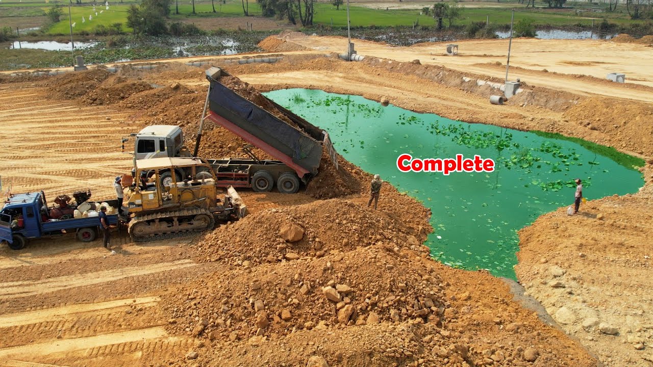 Ultimate Display With Might Strong Power Bulldozer Pushing Red Soil Complete Some Part of Lake