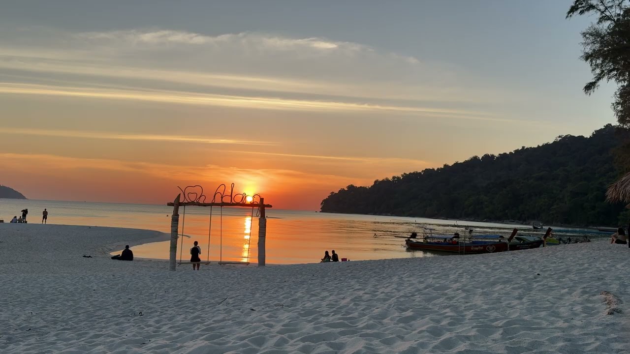 4K view sunset at Adang Beach, near Koh Lipe, Thailand.