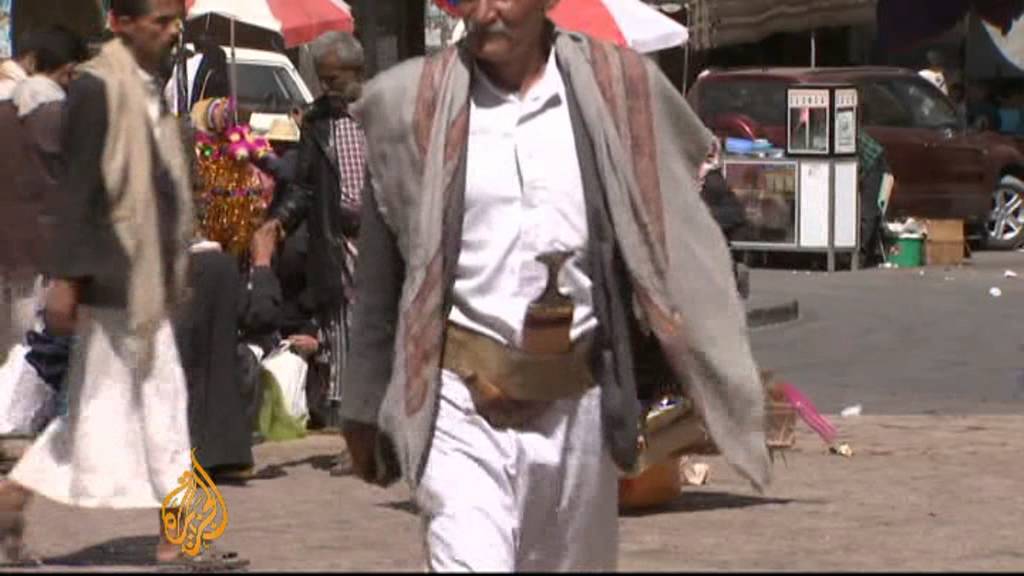 Yemenis refuse to put down their weapons