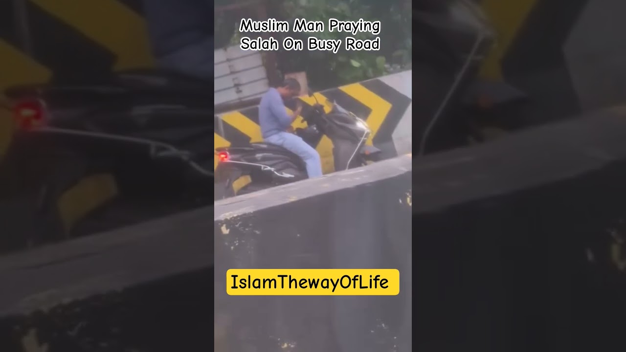 Muslim Man Praying Salah On Busy Road