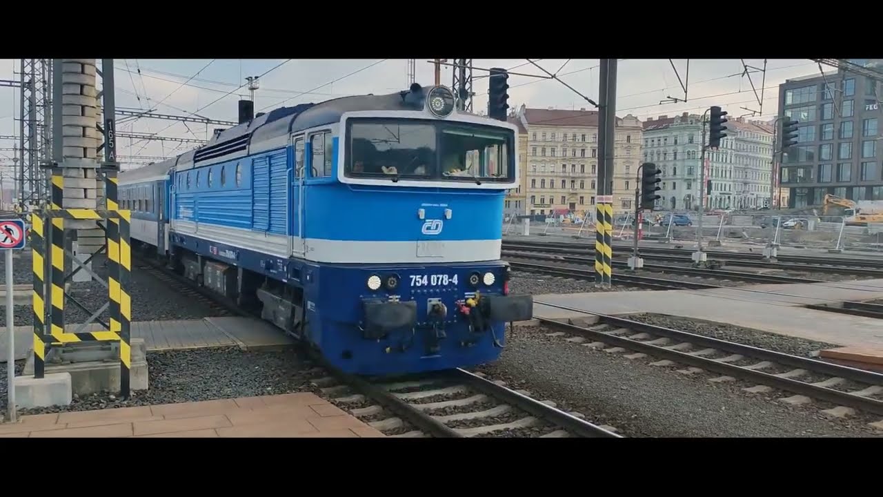 Busy Railway Station with Passing Trains