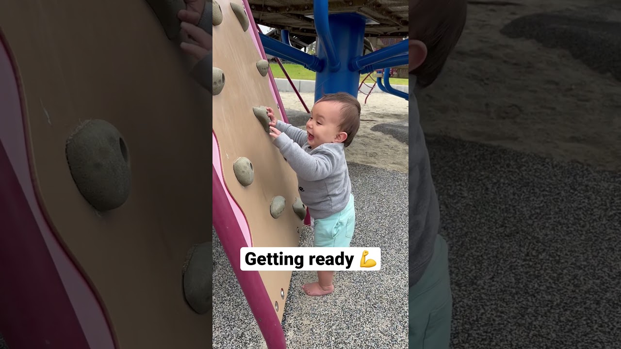 Baby on a climbing wall
