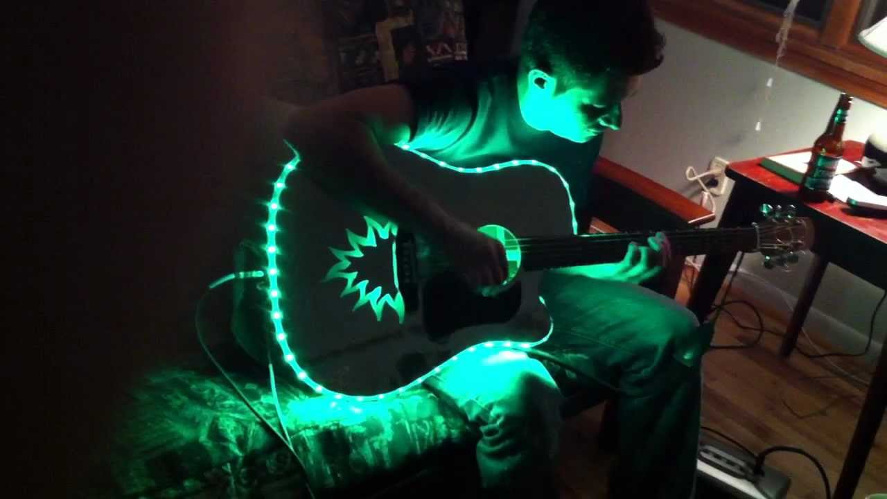 Light up sound activated multicolor LED guitar
