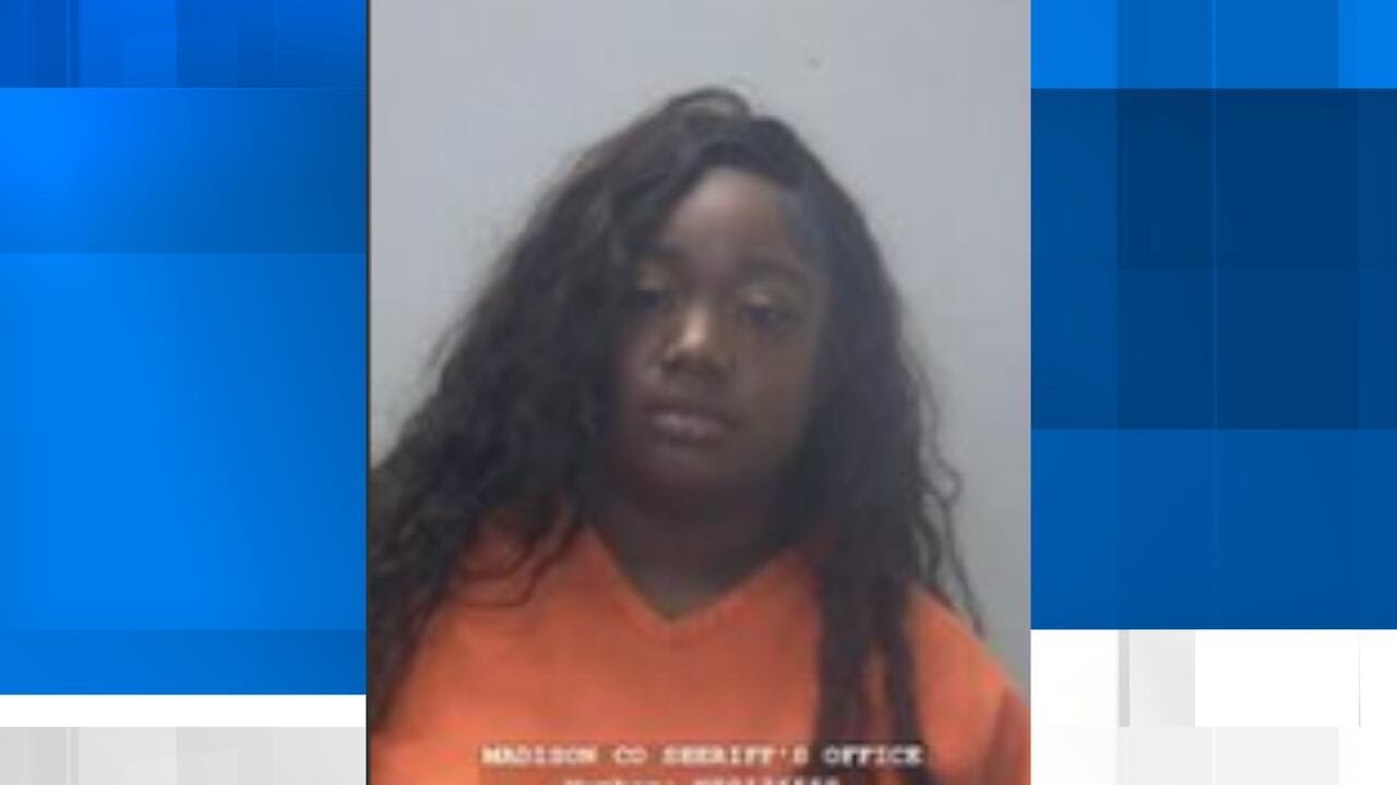 Woman accused of using counterfeit money at Bridge Street store