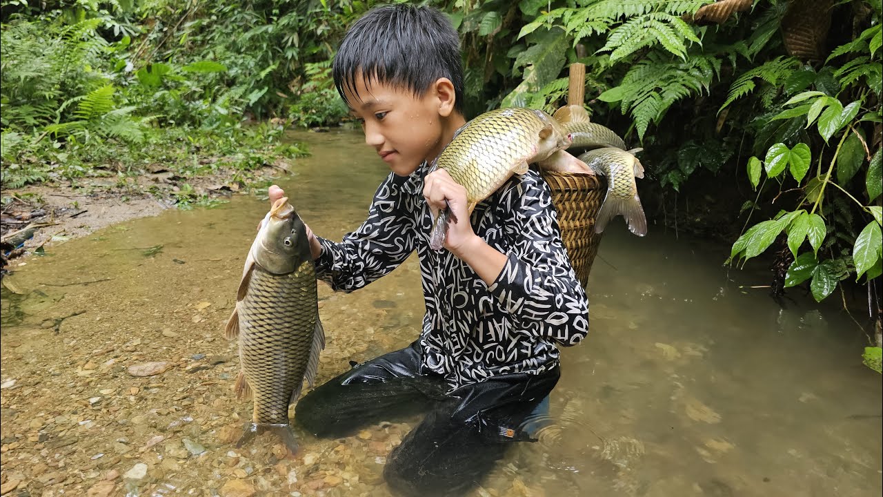 The orphan boy Nam's caught a lot of big carp to sell andgave some to the grandmother who helped Nam