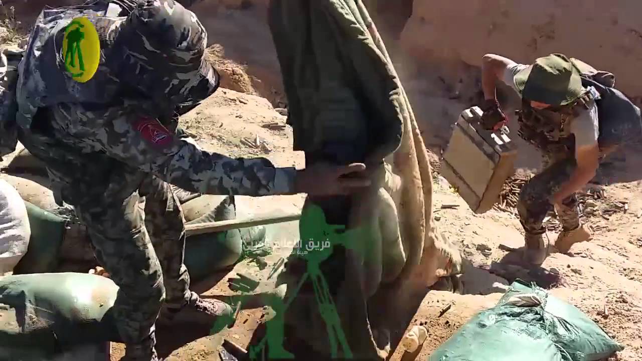 Iraqi Popular Mobilization Units clearing an ISIS position