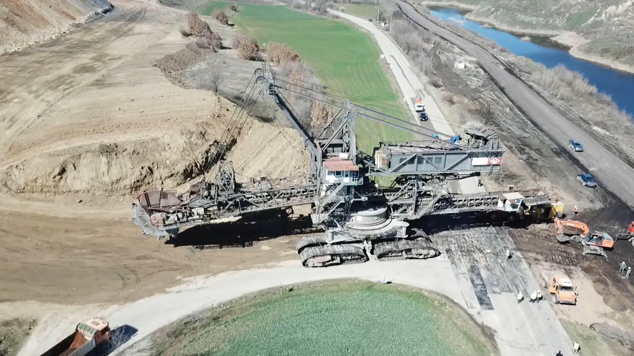 Huge Bucket Wheel Excavator Crossing The Street - Mining Excavator