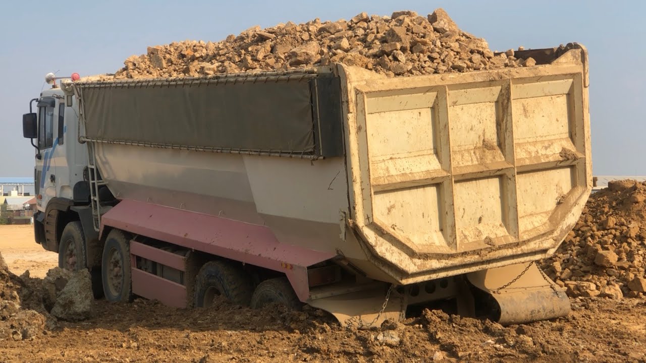 Dump truck stuck in deep mud recovery by bulldozer KUMALSU D61PX