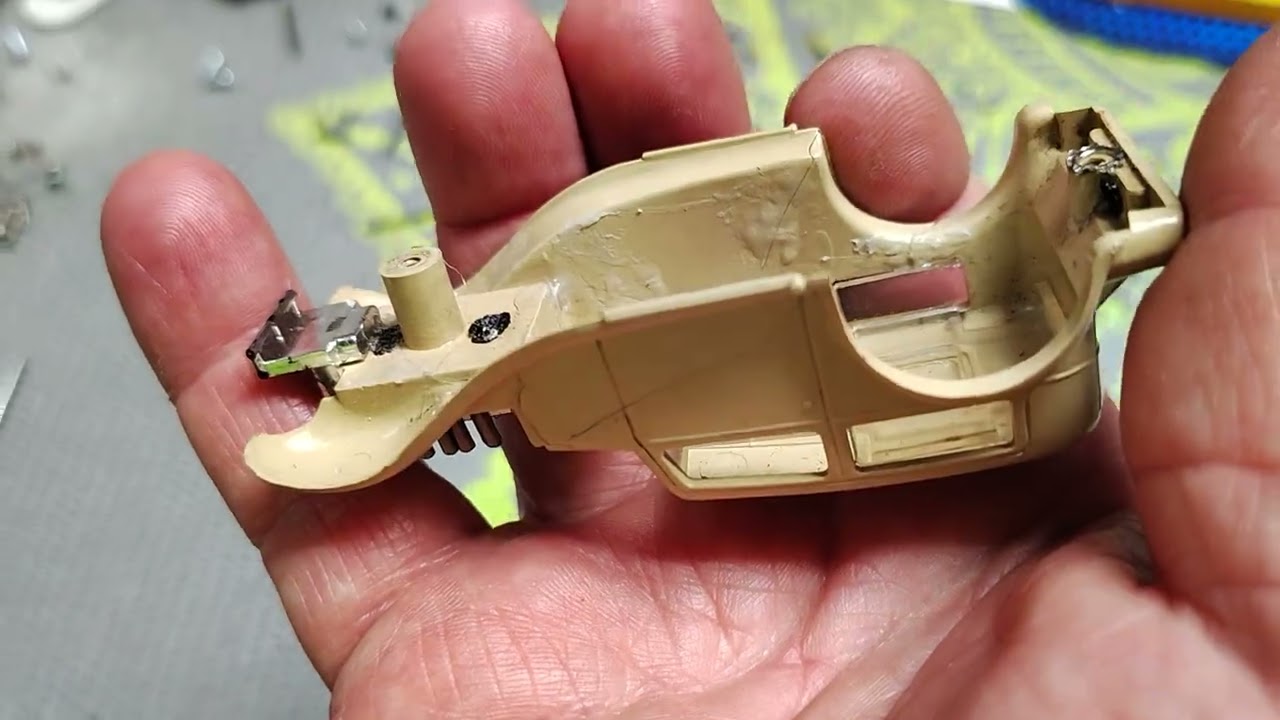 O- gauge slot car chassis repair and looking at the repaired cracked up body HO slot