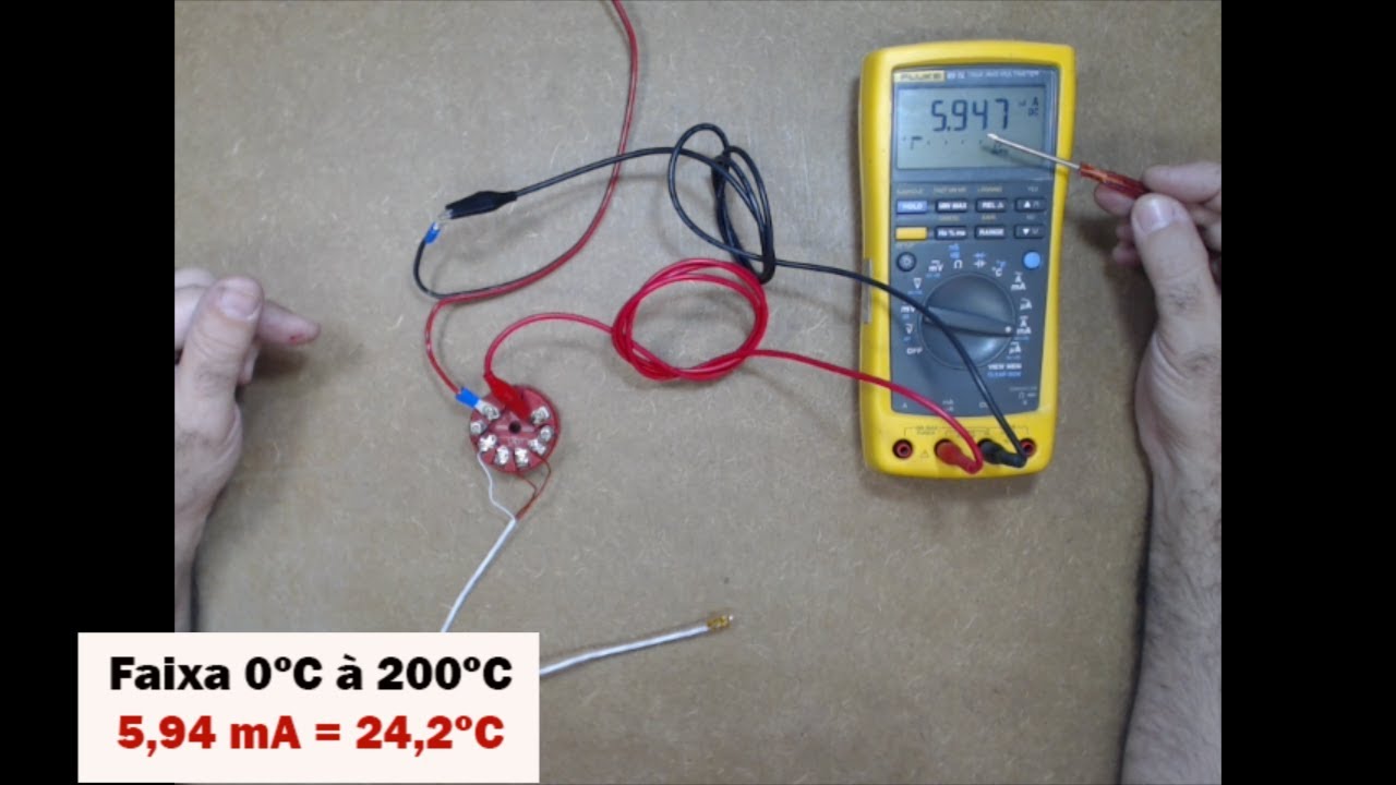 Ligação Pt100 3 fios e transmissor temperatura 4 a 20 mA com multímetro em experiência sobre bancada