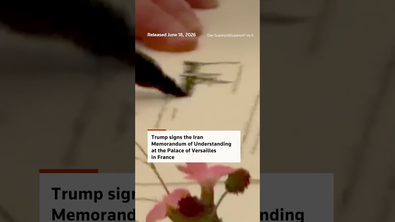 WARNING: FLASHING IMAGES -Trump signs Iran deal at Versailles