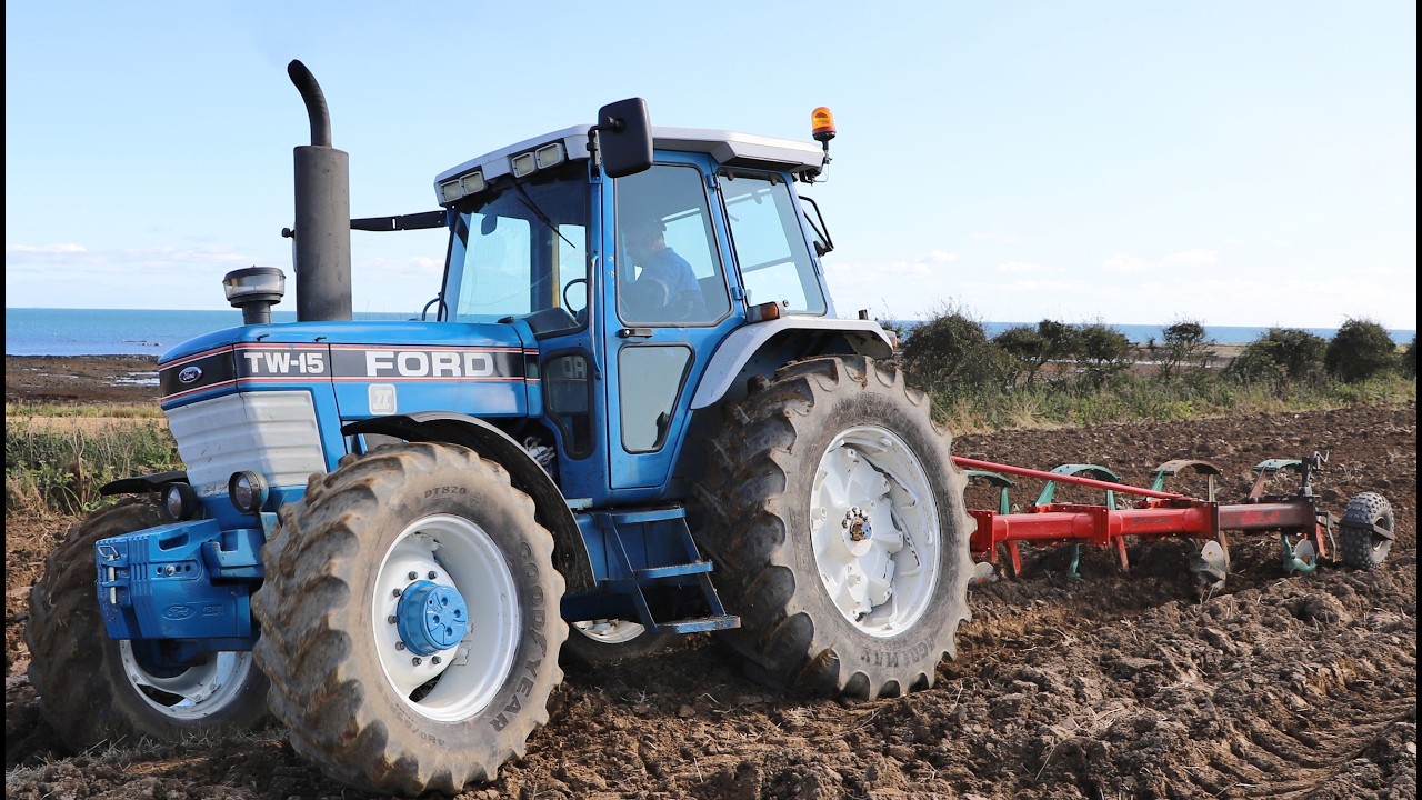 Ford and County Tractors at work ploughing close to Ballyquintin Point in Co. Down