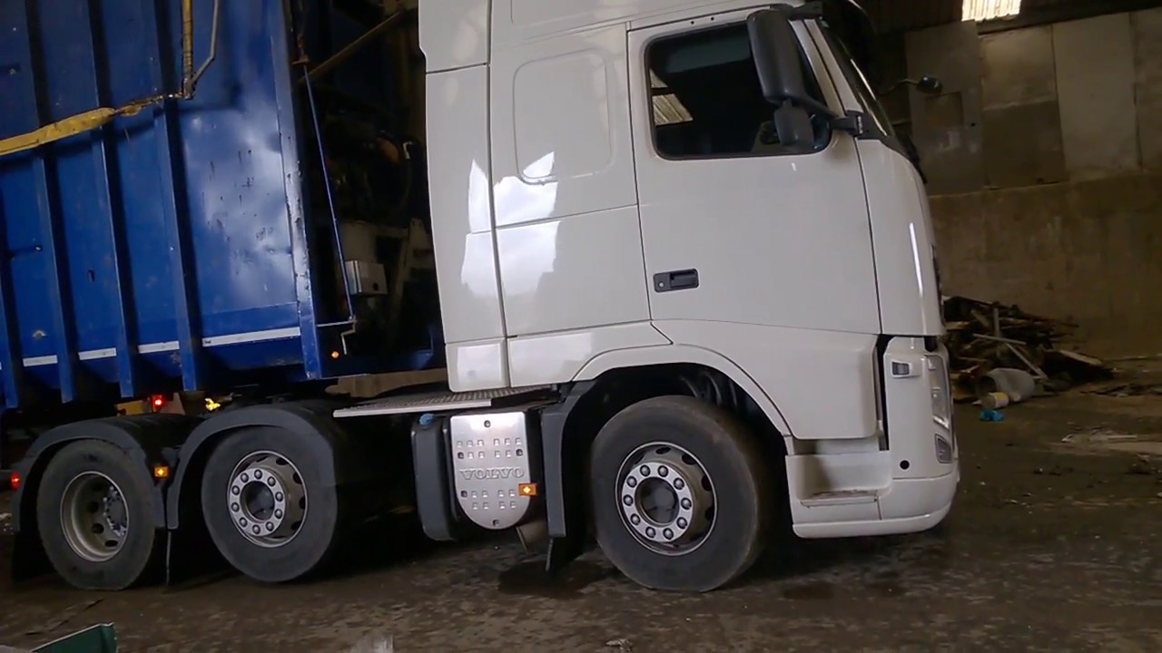 Getting loaded with waste, BMI ejector trailer