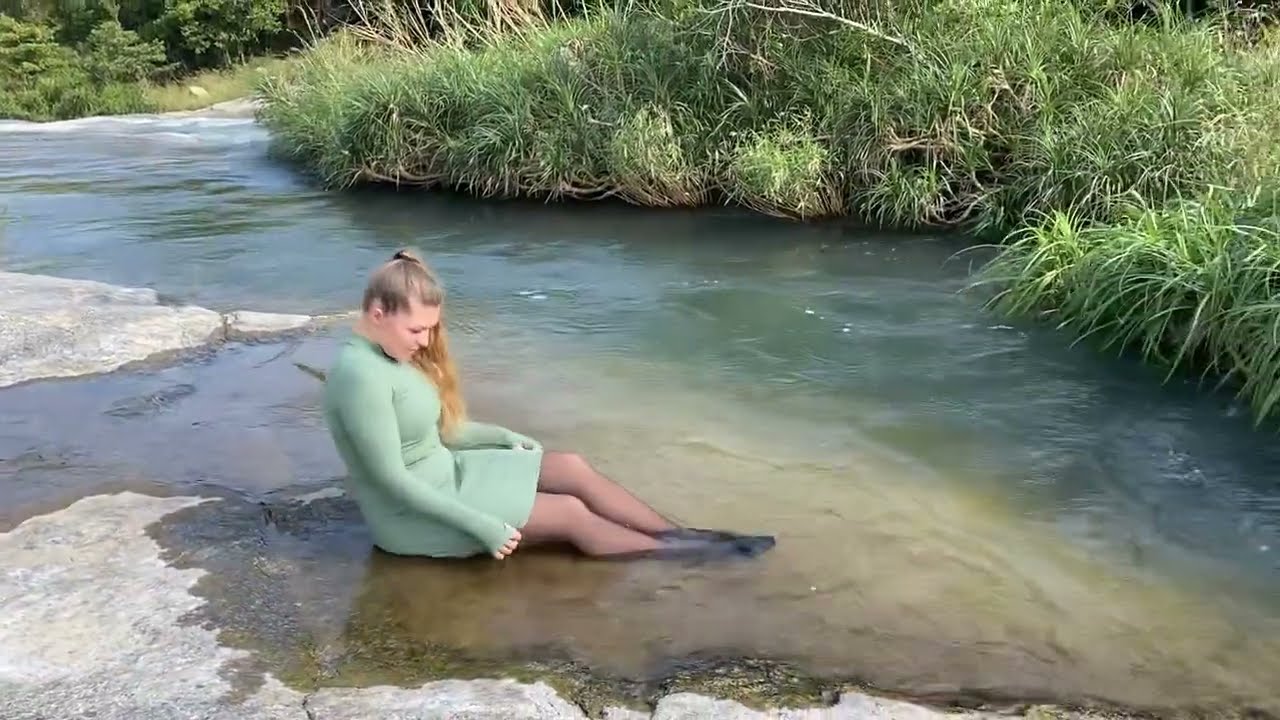 Green dress • Black nylon • Lulu swims in the river