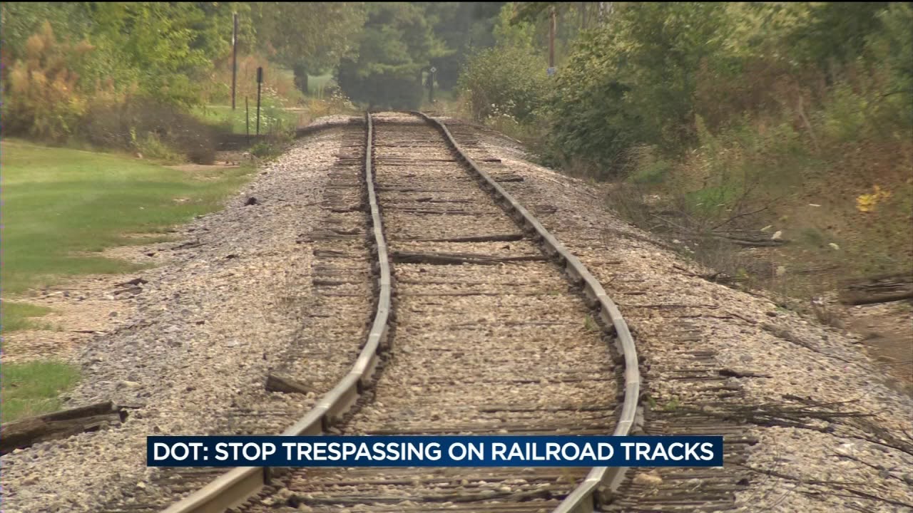 DOT urges people to stop trespassing on railroad tracks, driving around train gates
