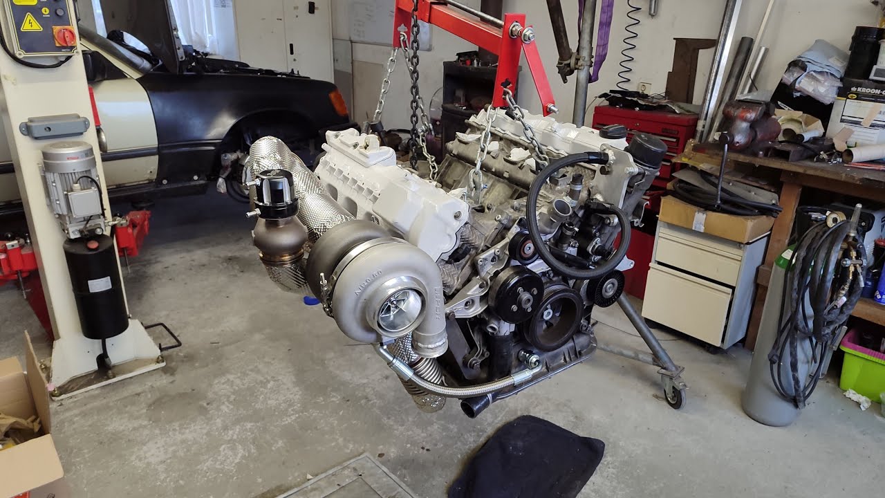 New turbo oil drain.  Engine mods done for big dowpipe.  S124 V8 Turbo !