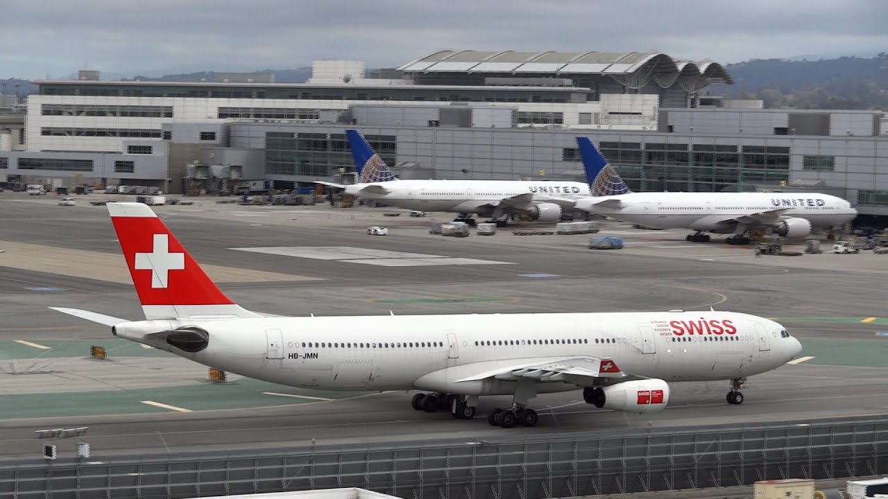 [ATC] United Airlines 747, Swiss A340 landing at San Francisco International Airport
