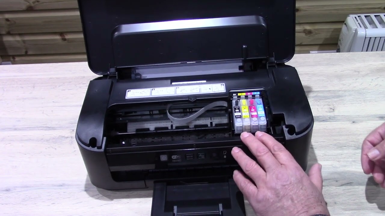 Receiving an Epson WF-2010W printer with refillable cartridges installed
