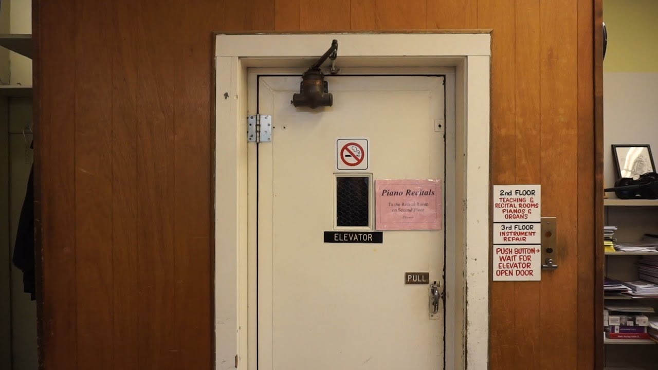 Original antique OTIS single-speed traction passenger elevator @ Leithold Music, La Crosse, WI