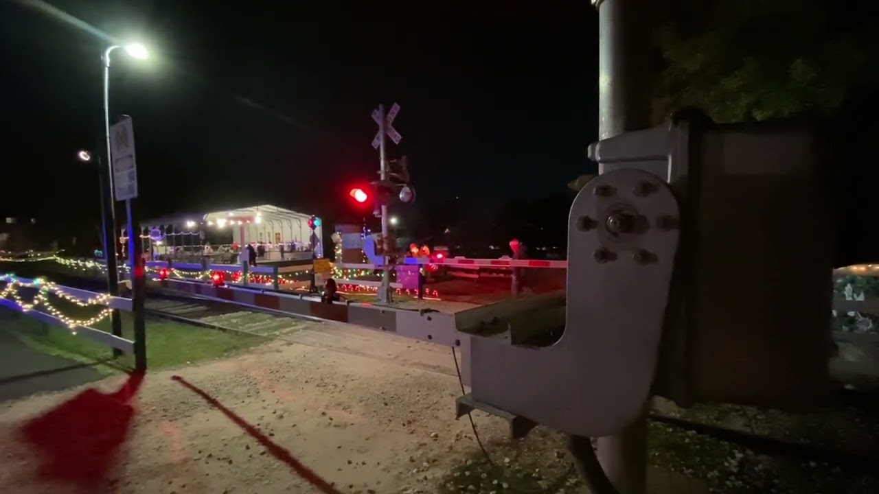 Christmas Train And Malfunctioning Railroad Crossing Gates