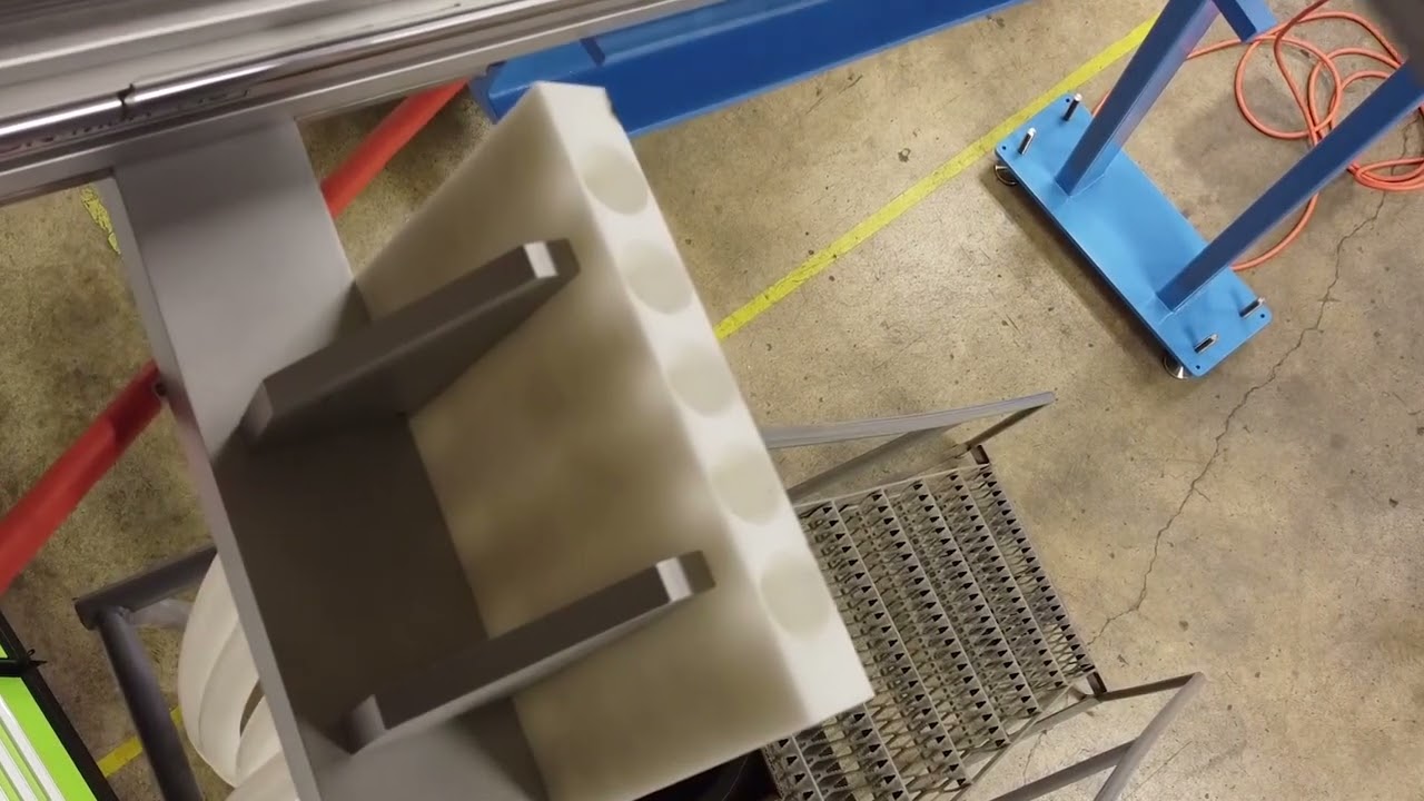 Long parts feeder for an automated wheel assembly station
