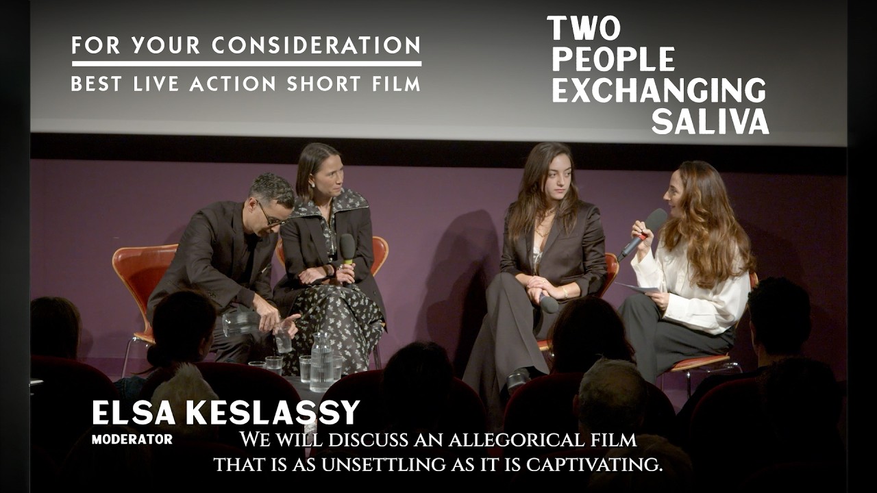 Elsa Keslassy discusses with actress Luàna Bajrami and Musteata & Singh TWO PEOPLE EXCHANGING SALIVA