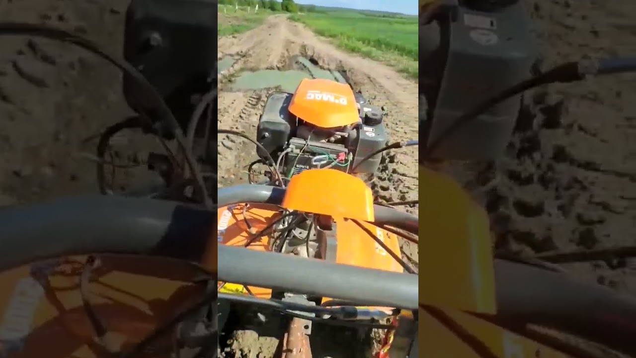 O-mac 12 cp cu diferențial prin noroi