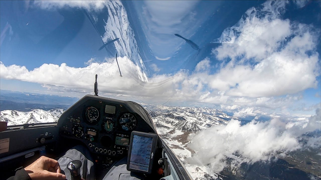 A Dicey Climb, A High-Speed Cruise, A Delicate Descent - Glider surfs Rocky Mountains Convergence