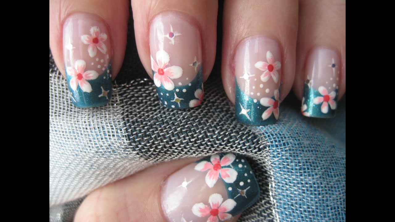 Nail art: French tip with flowers and stars