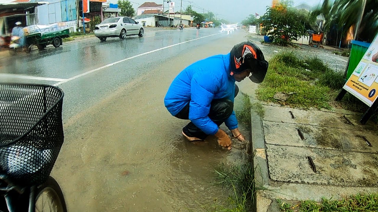 That Importance To Remove All Trash And Plastic Clogged Culvert On Street