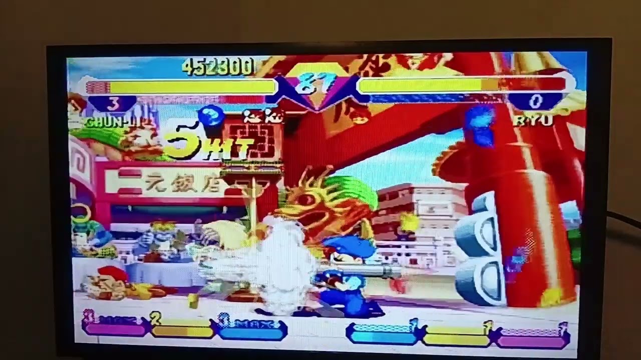 Yatta,  jogando Pocket Fighter 