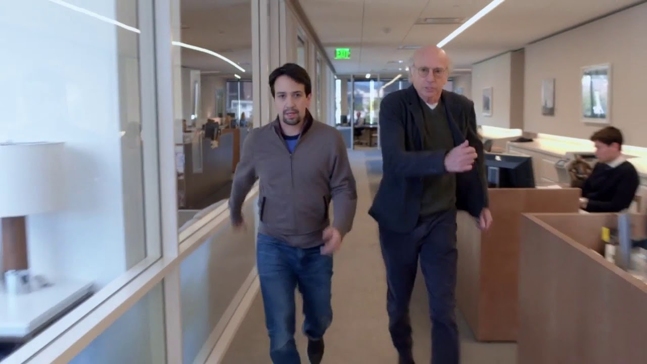 Curb Your Enthusiasm - Larry races Lin-Manuel Miranda for the desk position. And loses..